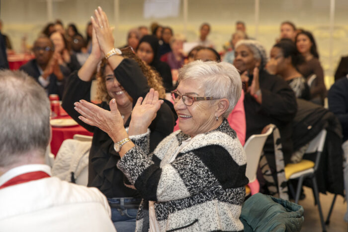 Friday being cheered after winning Older Volunteer of the Year 2025