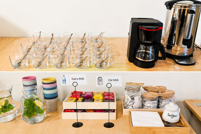 a table topped with plates of sandwiches and croissants
